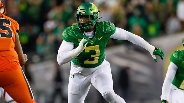 EUGENE, OREGON - NOVEMBER 24: Brandon Dorlus #3 of the Oregon Ducks rushes the edge in the first half during a game against the Oregon State Beavers at Autzen Stadium on November 24, 2023 in Eugene, Oregon.