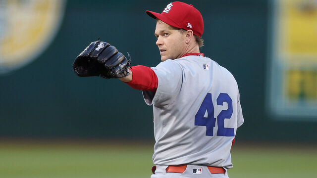 OAKLAND, CALIFORNIA - APRIL 15: Sonny Gray #54 of the St. Louis Cardinals points back towards catcher Willson Contreras #40 after Contreras threw out a base runner against the Oakland Athletics in the first inning at Oakland Coliseum on April 15, 2024 in Oakland, California. All players are wearing the number 42 in honor of Jackie Robinson Day.