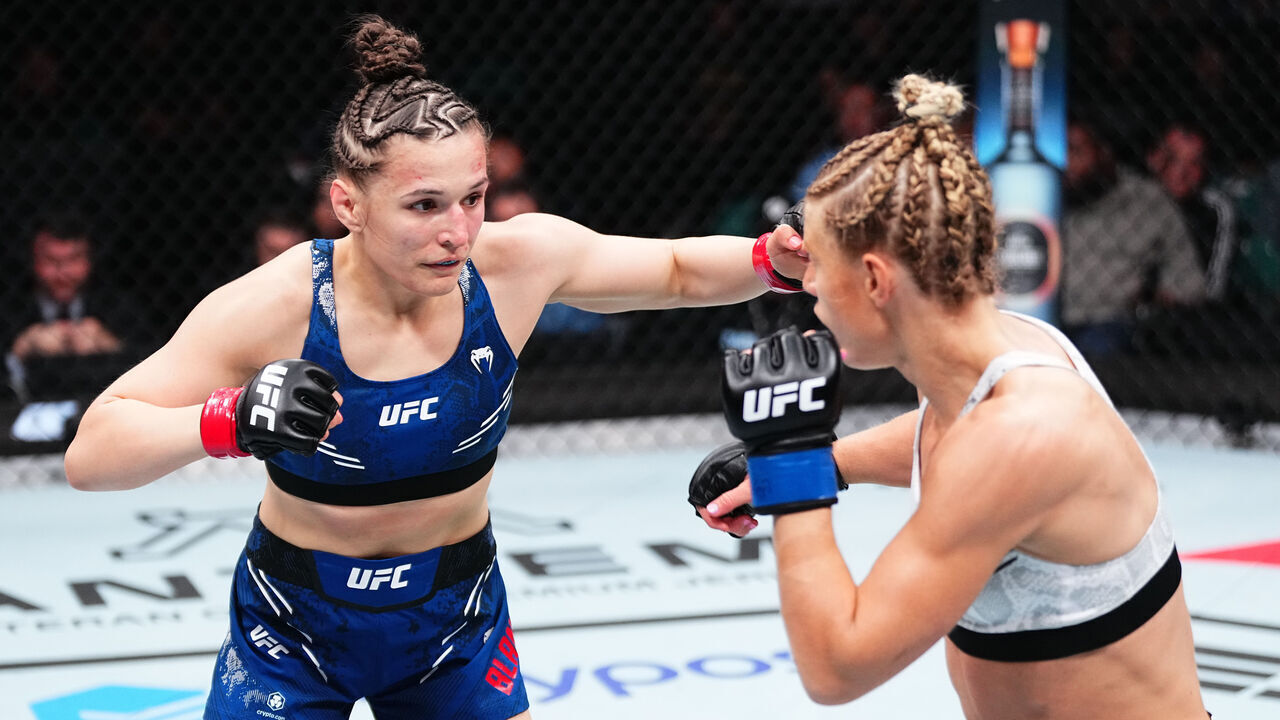 ATLANTIC CITY, NEW JERSEY - MARCH 30: (L-R) Erin Blanchfield punches Manon Fiorot of France in a flyweight bout during the UFC Fight Night event at Boardwalk Hall Arena on March 30, 2024 in Atlantic City, New Jersey.