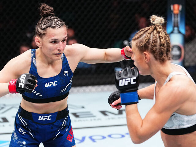 ATLANTIC CITY, NEW JERSEY - MARCH 30: (L-R) Erin Blanchfield punches Manon Fiorot of France in a flyweight bout during the UFC Fight Night event at Boardwalk Hall Arena on March 30, 2024 in Atlantic City, New Jersey.