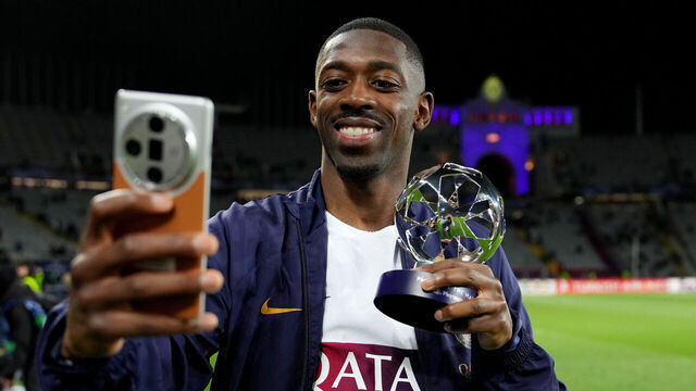 BARCELONA, SPAIN - APRIL 16: Ousmane Dembele of Paris Saint-Germain poses for a 'selfie' with the PlayStation Player Of The Match award after the team's victory in the UEFA Champions League quarter-final second leg match between FC Barcelona and Paris Saint-Germain at Estadi Olimpic Lluis Companys on April 16, 2024 in Barcelona, Spain.