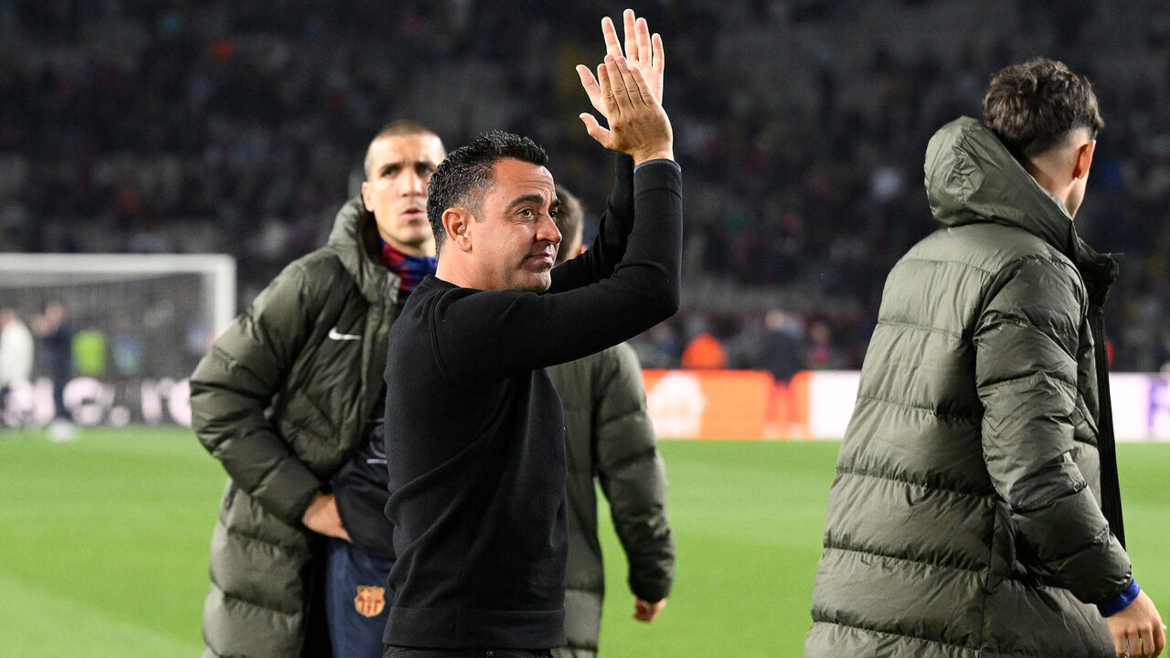 Barcelona's Spanish coach Xavi applauds at the end of the UEFA Champions League quarter-final second leg football match between FC Barcelona and Paris SG at the Estadi Olimpic Lluis Companys in Barcelona on April 16, 2024. Paris Saint-Germain won 1-4.