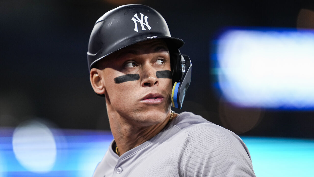 TORONTO, ON - APRIL 15: Aaron Judge #99 of the New York Yankees looks on against the Toronto Blue Jays during the third inning in their MLB game at the Rogers Centre on April 15, 2024 in Toronto, Ontario, Canada. All players are wearing the number 42 in honor of Jackie Robinson Day.