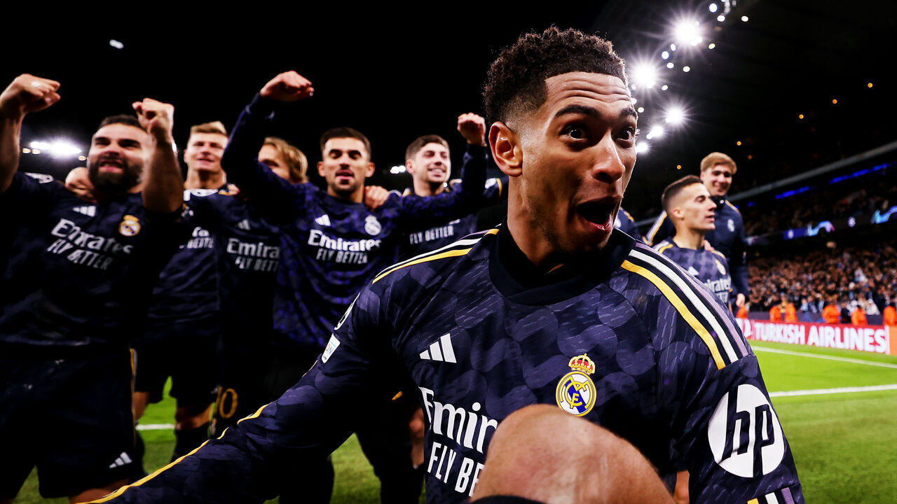 MANCHESTER, ENGLAND - APRIL 17: Jude Bellingham of Real Madrid celebrates with the fans following the team's victory in the penalty shoot out during the UEFA Champions League quarter-final second leg match between Manchester City and Real Madrid CF at Etihad Stadium on April 17, 2024 in Manchester, England.