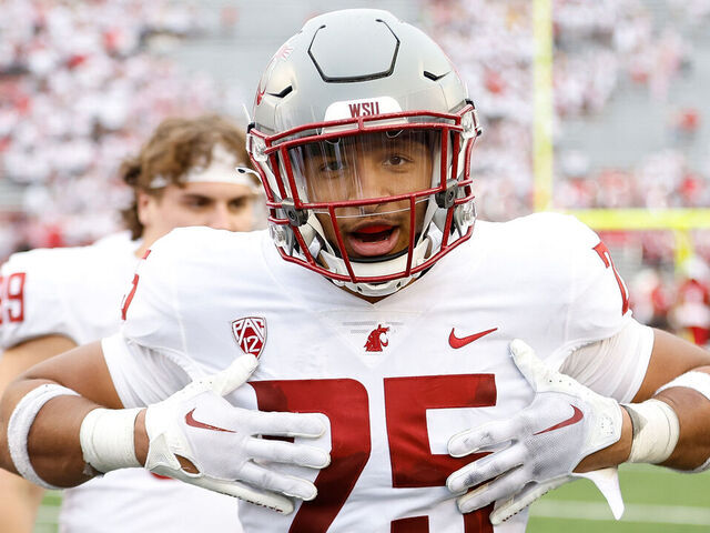 MADISON, WISCONSIN - SEPTEMBER 10: Jaden Hicks #25 of the Washington State Cougars celebrates a win over the Wisconsin Badgers at Camp Randall Stadium on September 10, 2022 in Madison, Wisconsin.