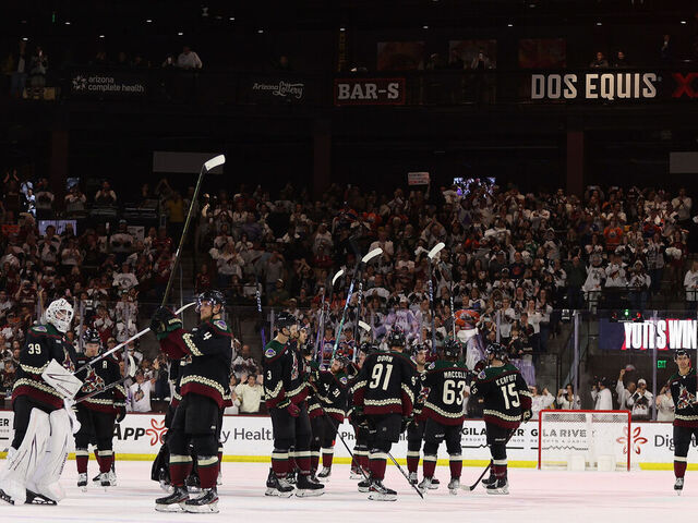 TEMPE, ARIZONA - APRIL 17: The Arizona Coyotes salute the fans after defeating the Edmonton Oilers in the NHL game at Mullett Arena on April 17, 2024 in Tempe, Arizona. The Coyotes defeated the Oilers 5-2.