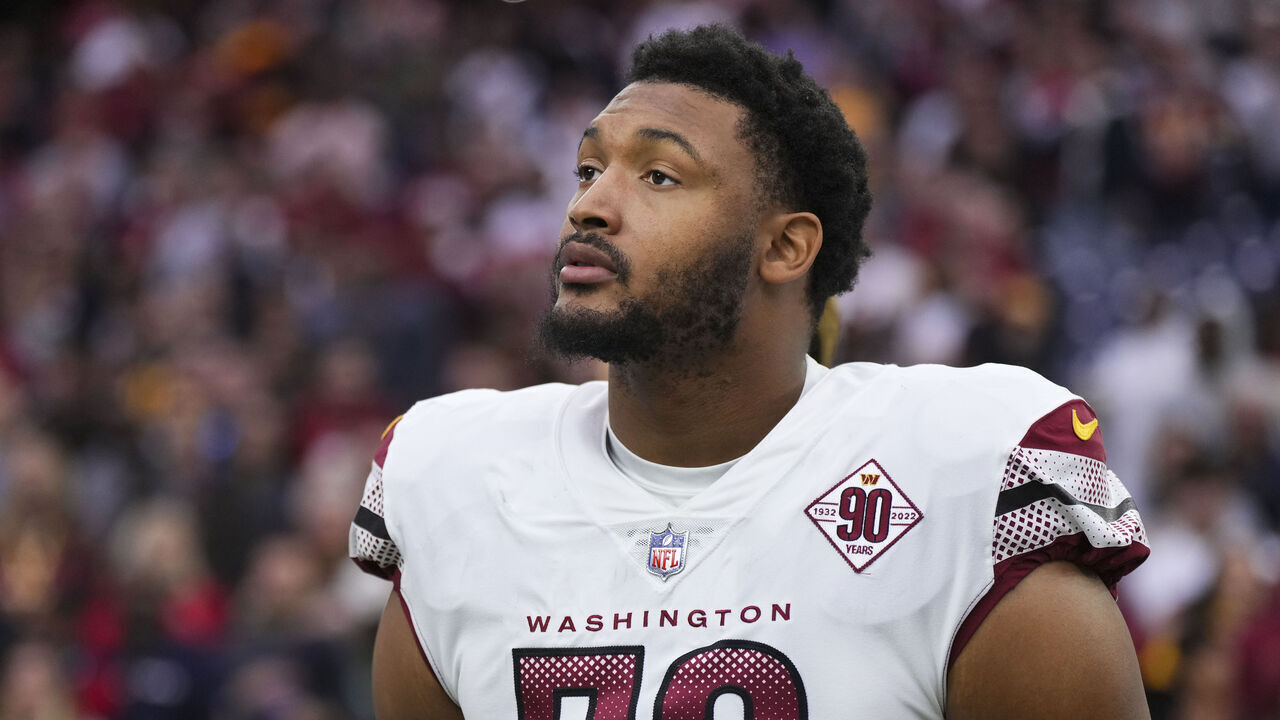HOUSTON, TX - NOVEMBER 20: Shaka Toney #58 of the Washington Commanders stands during the national anthem against the Houston Texans at NRG Stadium on November 20, 2022 in Houston, Texas.