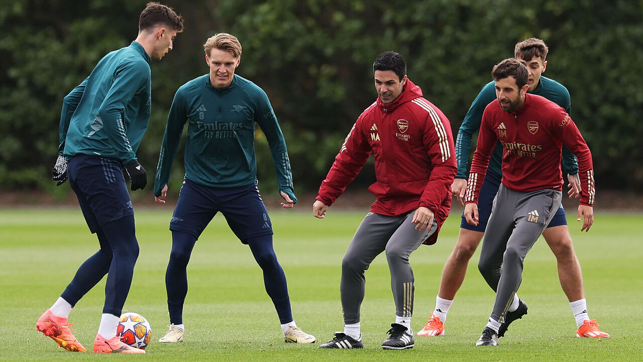 ST ALBANS, ENGLAND - APRIL 16: Mikel Arteta, Manager of Arsenal, participates in a training session alongside his players Kai Havertz and Martin Odegaard at London Colney on April 16, 2024 in St Albans, England.