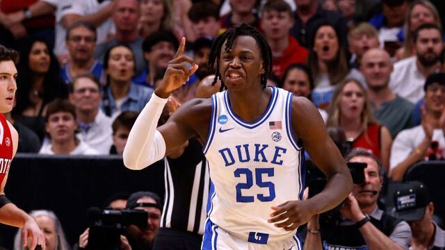 DALLAS, TEXAS - MARCH 31: Mark Mitchell #25 of the Duke Blue Devils reacts during the first half against the NC State Wolfpack in the Elite 8 round of the NCAA Men's Basketball Tournament at American Airlines Center on March 31, 2024 in Dallas, Texas.