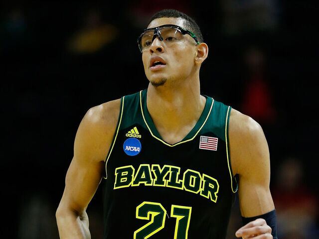 SAN ANTONIO, TX - MARCH 23: Isaiah Austin #21 of the Baylor Bears runs up the floor against the Creighton Bluejays during the third round of the 2014 NCAA Men's Basketball Tournament at the AT&T Center on March 23, 2014 in San Antonio, Texas.