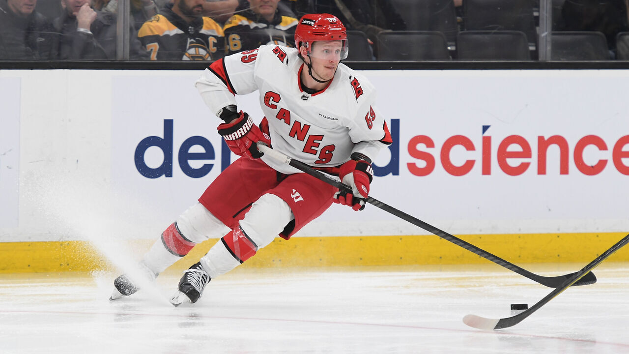 BOSTON, MASSACHUSETTS - APRIL 9: Jake Guentzel #59 of the Carolina Hurricanes skates with the puck against the Boston Bruins at the TD Garden on April 9, 2024 in Boston, Massachusetts.