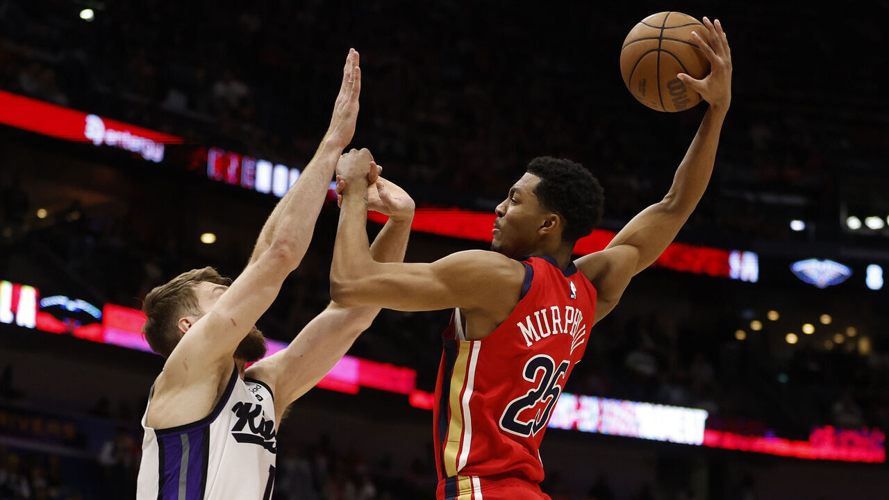 NEW ORLEANS, LOUISIANA - APRIL 19: Trey Murphy III #25 of the New Orleans Pelicans. shoots the ball over Domantas Sabonis #10 of the Sacramento Kings at Smoothie King Center on April 19, 2024 in New Orleans, Louisiana.