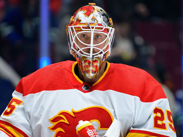 VANCOUVER, CANADA - APRIL 16: Jacob Markstrom #25 of the Calgary Flames looks on during the first period of the NHL game against the Vancouver Canucks at Rogers Arena on April 16, 2024 in Vancouver, British Columbia, Canada.