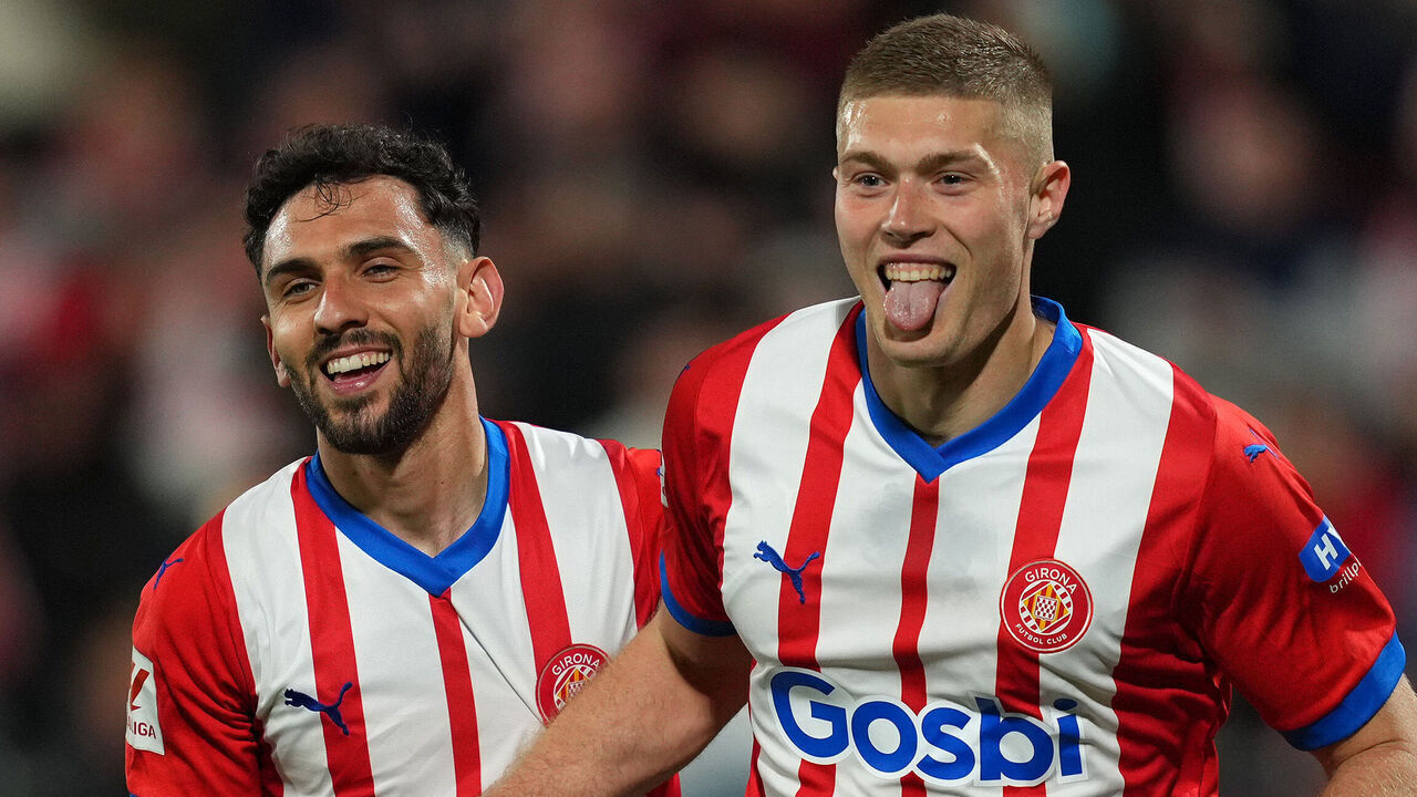 GIRONA, SPAIN - APRIL 20: Artem Dovbyk of Girona FC celebrates scoring his team's third goal with Ivan Martin during the LaLiga EA Sports match between Girona FC and Cadiz CF at the Montilivi Stadium on April 20, 2024 in Girona, Spain.