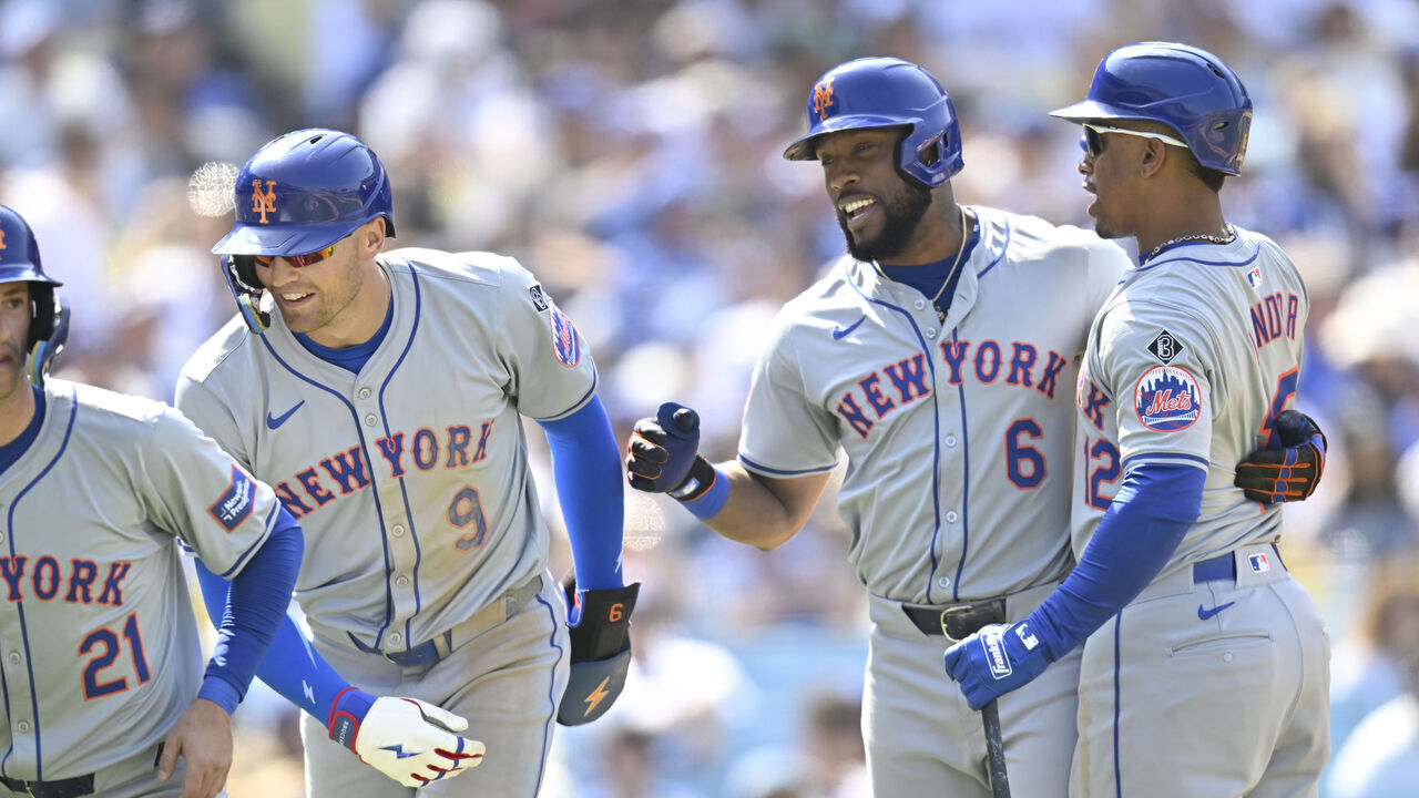 LOS ANGELES, CALIFORNIA - APRIL 20: Starling Marte #6 of the New York Mets is congratulated by Zack Short #21, Brandon Nimmo #9 and Francisco Lindor #12 after hitting a 3-run home run in the sixth inning against the Los Angeles Dodgers at Dodger Stadium on April 20, 2024 in Los Angeles, California.