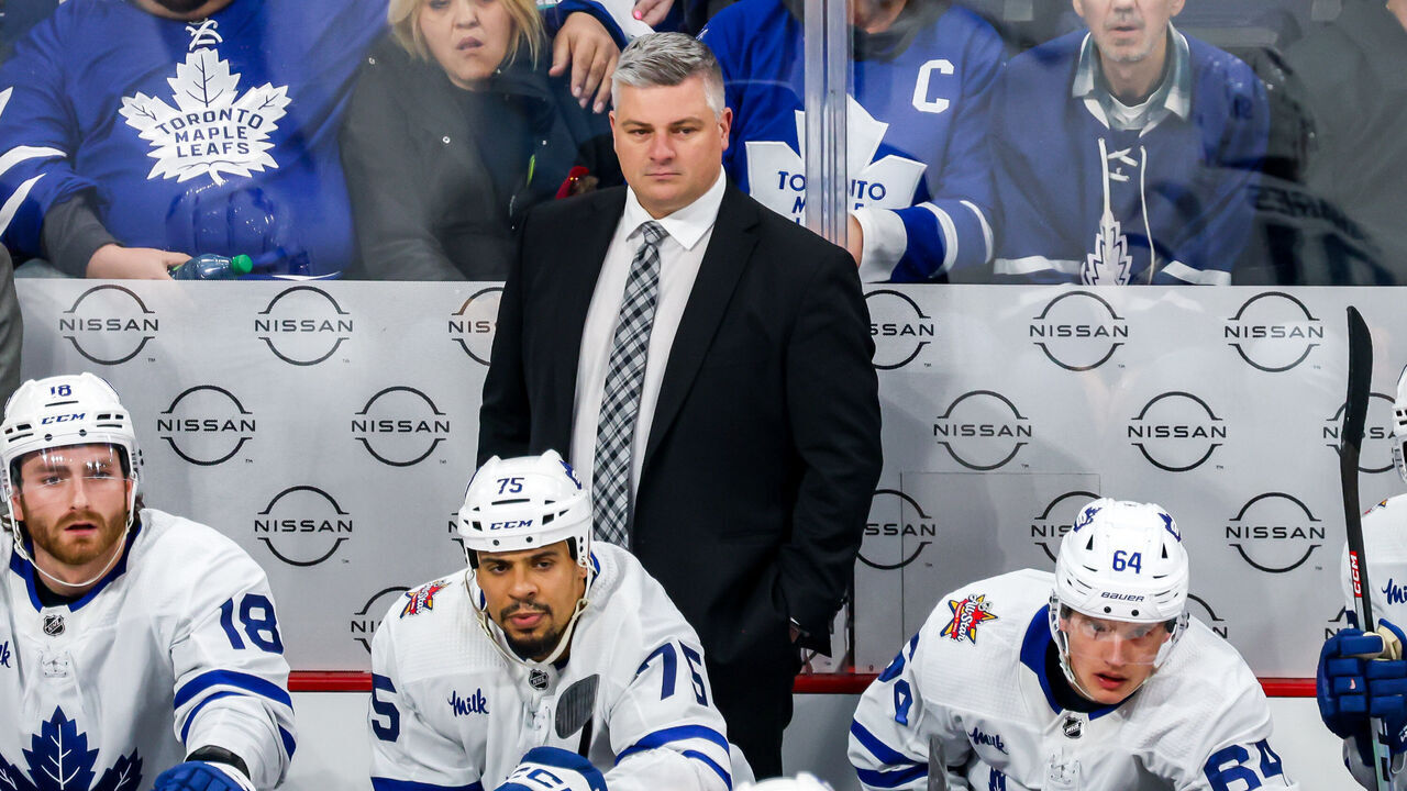 WINNIPEG, CANADA - JANUARY 27: Head Coach Sheldon Keefe of the Toronto Maple Leafs looks on from the bench during second period action against the Winnipeg Jets at the Canada Life Centre on January 27, 2024 in Winnipeg, Manitoba, Canada.