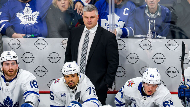 WINNIPEG, CANADA - JANUARY 27: Head Coach Sheldon Keefe of the Toronto Maple Leafs looks on from the bench during second period action against the Winnipeg Jets at the Canada Life Centre on January 27, 2024 in Winnipeg, Manitoba, Canada.