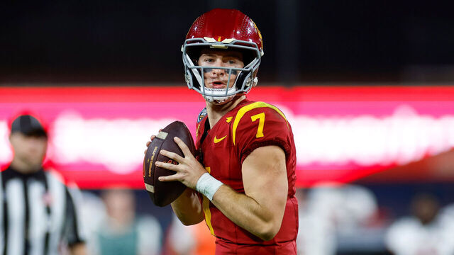 SAN DIEGO, CALIFORNIA - DECEMBER 27: Miller Moss #7 of the USC Trojans looks for an open receiver in the second half during the DIRECTV Holiday Bowl game against the Louisville Cardinals at Petco Park on December 27, 2023 in San Diego, California.