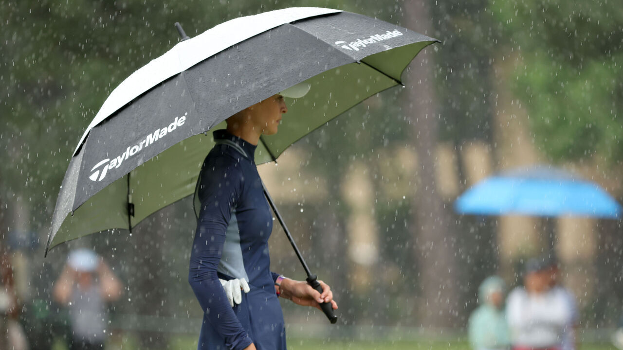 THE WOODLANDS, TEXAS - APRIL 20: Nelly Korda of the United States looks on from the sixth green under her umbrella during the third round of The Chevron Championship at The Club at Carlton Woods on April 20, 2024 in The Woodlands, Texas.