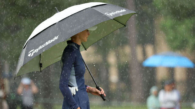 THE WOODLANDS, TEXAS - APRIL 20: Nelly Korda of the United States looks on from the sixth green under her umbrella during the third round of The Chevron Championship at The Club at Carlton Woods on April 20, 2024 in The Woodlands, Texas.