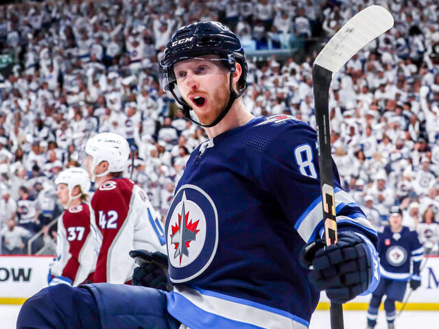 WINNIPEG, CANADA - APRIL 21: Kyle Connor #81 of the Winnipeg Jets celebrates after scoring a third period goal against the Colorado Avalanche in Game One of the First Round of the 2024 Stanley Cup Playoffs at the Canada Life Centre on April 21, 2024 in Winnipeg, Manitoba, Canada.