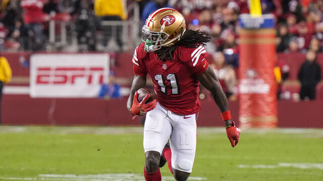 SANTA CLARA, CALIFORNIA - DECEMBER 25: Brandon Aiyuk #11 of the San Francisco 49ers runs after the catch against the Baltimore Ravens during the second half at Levi's Stadium on December 25, 2023 in Santa Clara, California.