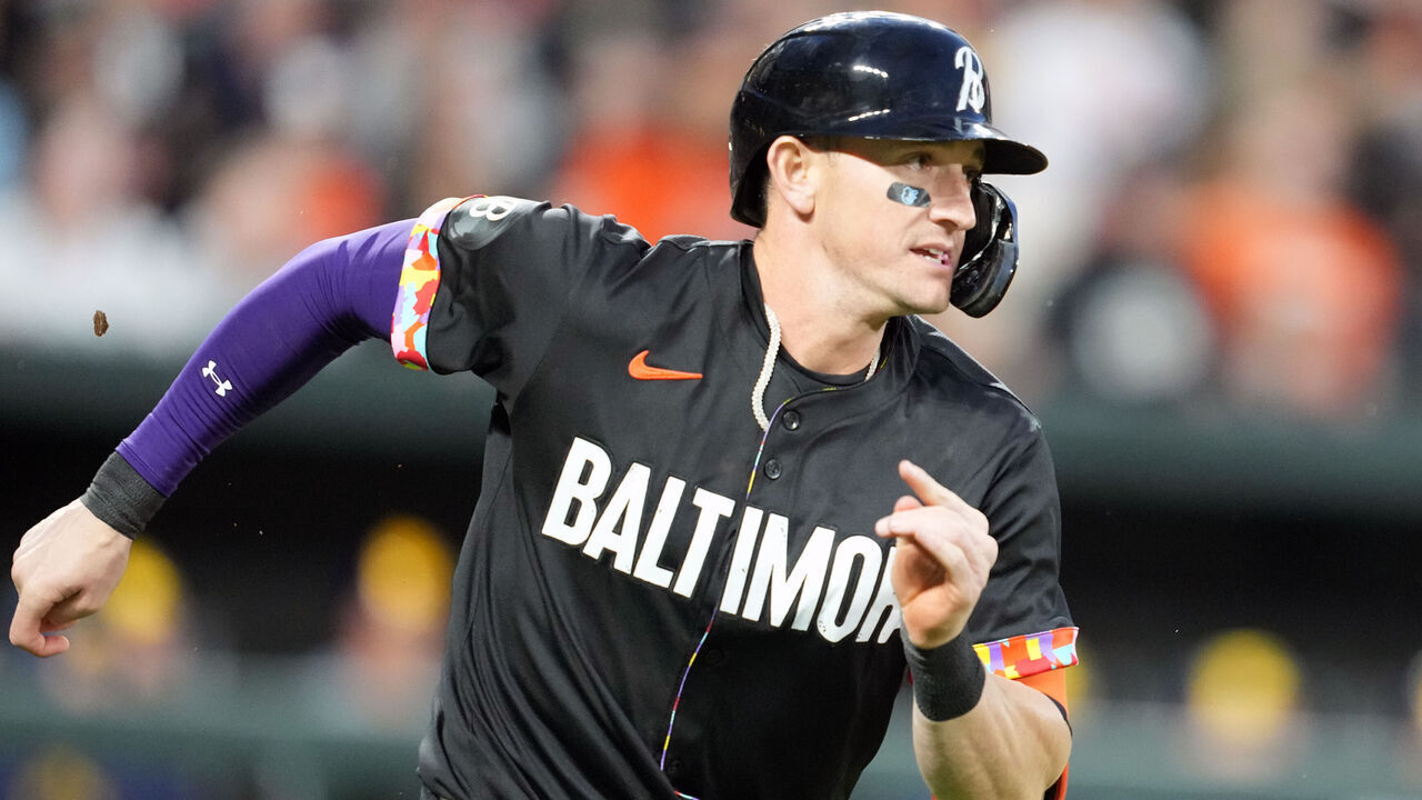 BALTIMORE, MARYLAND - APRIL 12: Austin Hays #21 of the Baltimore Orioles runs to first base during a baseball game against the Milwaukee Brewers at Oriole Park at Camden Yards on April 12, 2024 in Baltimore, Maryland.