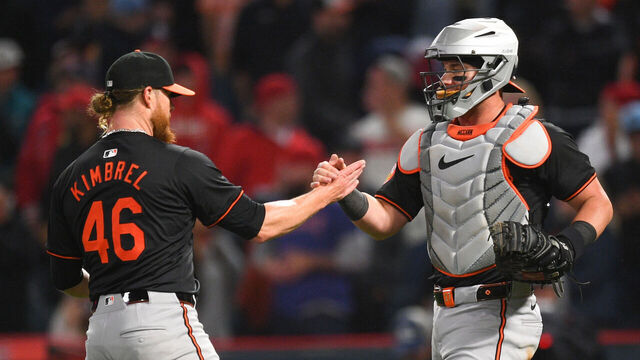 ANAHEIM, CA - APRIL 22: Baltimore Orioles pitcher Craig Kimbrel (46) celebrates with Baltimore Orioles catcher James McCann (27) after the MLB game between the Baltimore Orioles and the Los Angeles Angels of Anaheim on April 22, 2024 at Angel Stadium of Anaheim in Anaheim, CA.