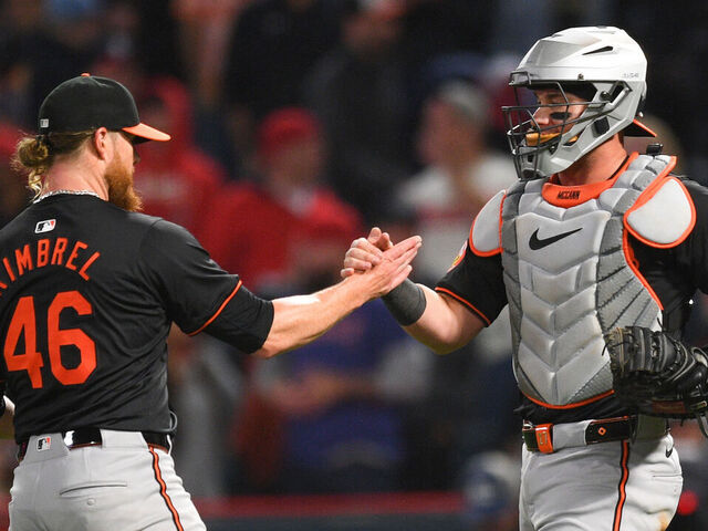 ANAHEIM, CA - APRIL 22: Baltimore Orioles pitcher Craig Kimbrel (46) celebrates with Baltimore Orioles catcher James McCann (27) after the MLB game between the Baltimore Orioles and the Los Angeles Angels of Anaheim on April 22, 2024 at Angel Stadium of Anaheim in Anaheim, CA.