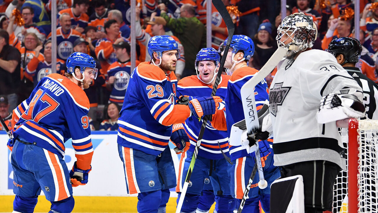 EDMONTON, CANADA - APRIL 22: Zach Hyman #18 of the Edmonton Oilers celebrates his third goal of the game in the third period against the Los Angeles Kings with teammates Connor McDavid #97, Leon Draisaitl #29 and Evan Bouchard #2 in Game One of the First Round of the 2024 Stanley Cup Playoffs at Rogers Place on April 22, 2024, in Edmonton, Alberta, Canada.