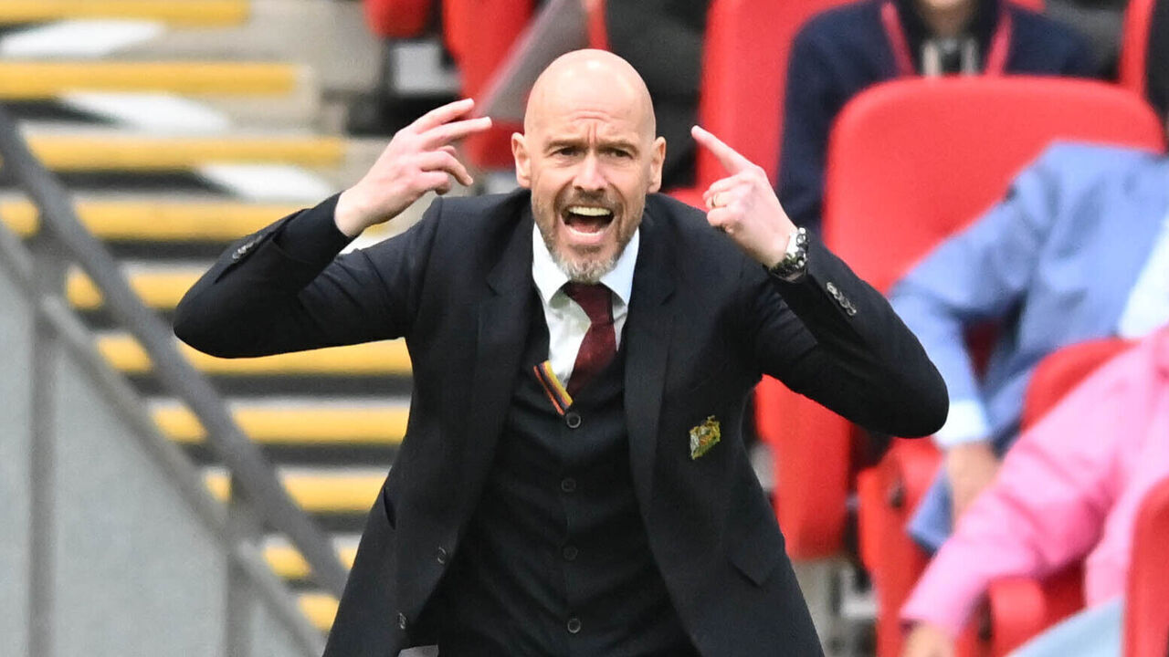 Manager Erik Ten Hag is pointing to his head during the FA Cup Semi-Final match between Coventry City and Manchester City at Wembley Stadium in London, on April 21, 2024.