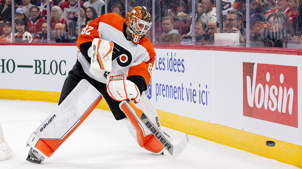 MONTREAL, CANADA - APRIL 9: Ivan Fedotov #82 of the Philadelphia Flyers clears the puck during the second period of the NHL regular season game against the Montreal Canadiens at the Bell Centre on April 9, 2024 in Montreal, Quebec, Canada. The Montreal Canadiens defeated the Philadelphia Flyers by a score of 9-3.