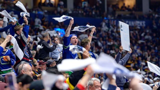 VANCOUVER, CANADA - APRIL 21: Vancouver Canucks fans wave rally towels during the second period in Game One of the First Round of the 2024 Stanley Cup Playoffs against the Nashville Predators at Rogers Arena on April 21, 2024 in Vancouver, British Columbia, Canada.