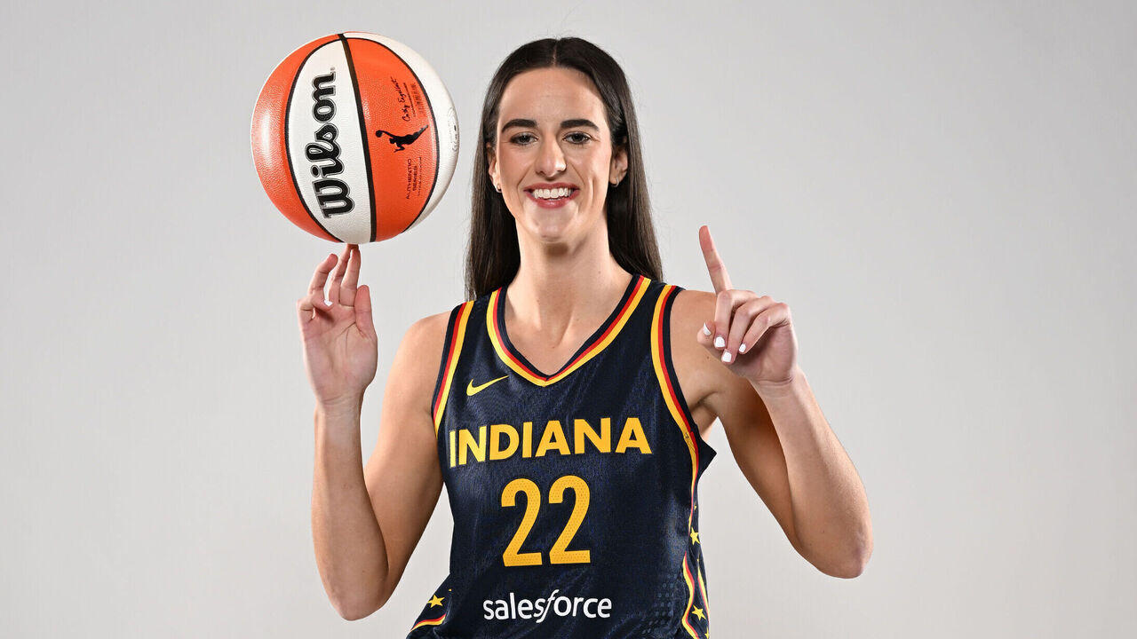 INDIANAPOLIS, IN - APRIL 17: Caitlin Clark #22 of the Indiana Fever poses for a portrait at Gainbridge Fieldhouse during her introductory press conference on April 17, 2024 at Gainbridge Fieldhouse in Indianapolis, Indiana. Mandatory Copyright Notice: Copyright 2024 NBAE