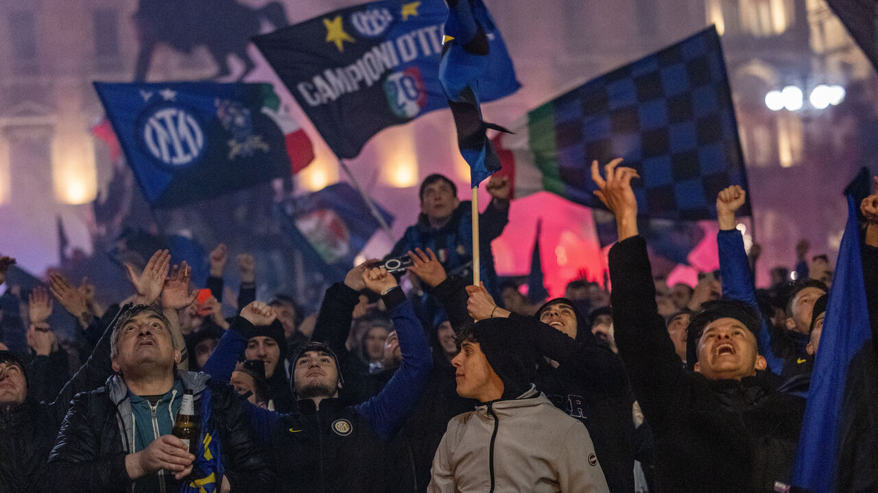 Inter supporters are celebrating the club's 20th Scudetto in Duomo Square, downtown Milan, following the final whistle of the Serie A TIM match between AC Milan and FC Internazionale at Stadio Giuseppe Meazza in Milan, Italy, on April 22, 2024.