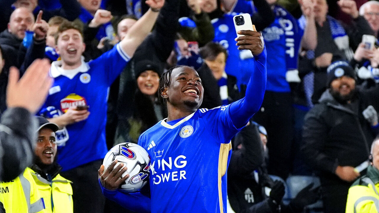 Leicester City's Abdul Fatawu records a video on a phone as he celebrates at the end of the Sky Bet Championship match at the King Power Stadium, Leicester. Picture date: Tuesday April 23, 2024.