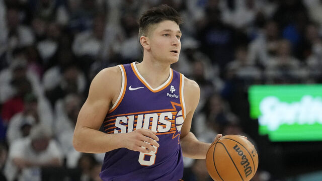 MINNEAPOLIS, MINNESOTA - APRIL 20: Grayson Allen #8 of the Phoenix Suns dribbles the ball during the second half in game one of the Western Conference First Round Playoffs against the Minnesota Timberwolves at Target Center on April 20, 2024 in Minneapolis, Minnesota.