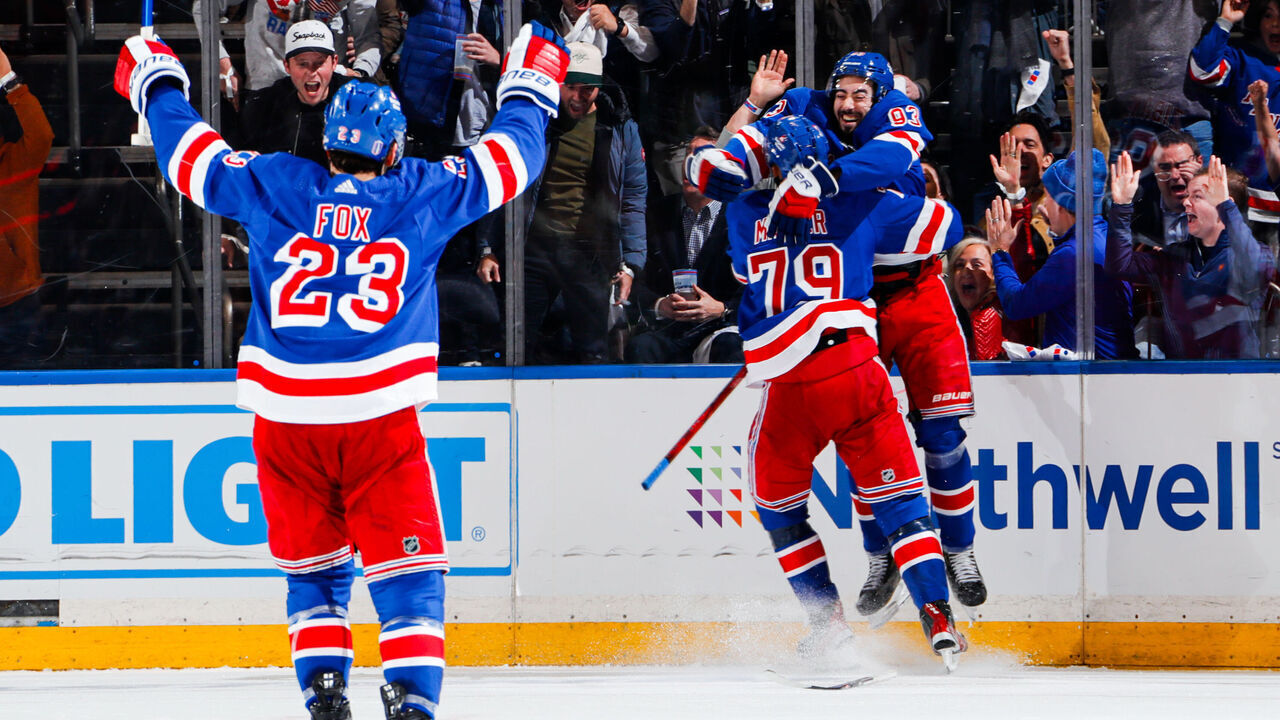 NEW YORK, NEW YORK - APRIL 23: K'Andre Miller #79, Mika Zibanejad #93 and Adam Fox #23 of the New York Rangers celebrate a second period goal against the Washington Capitals in Game Two of the First Round of the 2024 Stanley Cup Playoffs at Madison Square Garden on April 23, 2024 in New York City.