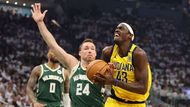 MILWAUKEE, WISCONSIN - APRIL 23: Pascal Siakam #43 of the Indiana Pacers is fouled by Pat Connaughton #24 of the Milwaukee Bucks during the first half of game two of the Eastern Conference First Round Playoffs at Fiserv Forum on April 23, 2024 in Milwaukee, Wisconsin.