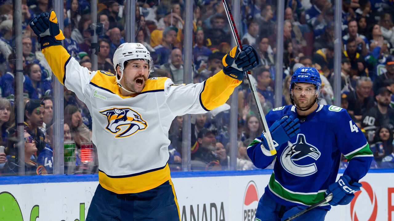 VANCOUVER, CANADA - APRIL 23: Noah Juulsen #47 of the Vancouver Canucks looks on dejected as Filip Forsberg #9 of the Nashville Predators celebrates after scoring during the 2nd period in Game Two of the First Round of the 2024 Stanley Cup Playoffs at Rogers Arena on April 23, 2024 in Vancouver, British Columbia, Canada.