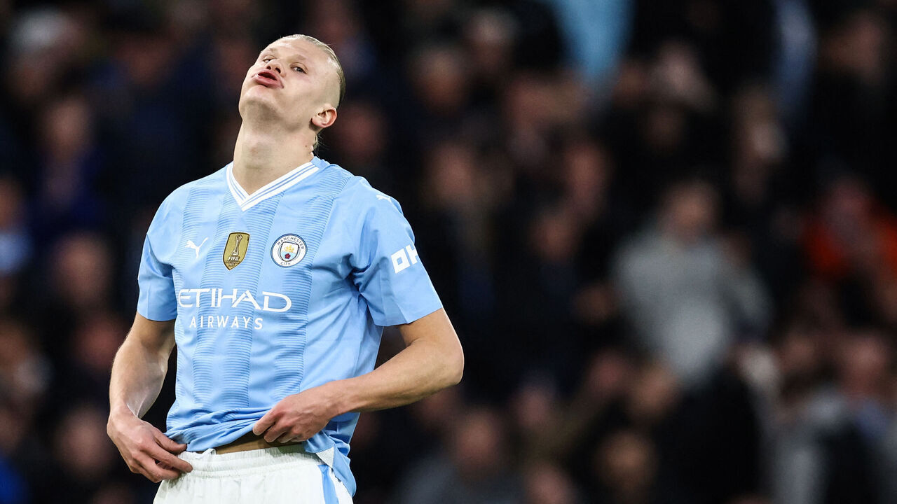 Manchester City's Norwegian striker #09 Erling Haaland reacts during the UEFA Champions League quarter-final second-leg football match between Manchester City and Real Madrid, at the Etihad Stadium, in Manchester, north-west England, on April 17, 2024.