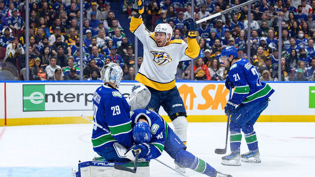 VANCOUVER, CANADA - APRIL 23: Elias Pettersson #40 and Casey DeSmith #29 of the Vancouver Canucks look on dejected as Colton Sissons #10 of the Nashville Predators celebrates after scoring during the 2nd period in Game Two of the First Round of the 2024 Stanley Cup Playoffs at Rogers Arena on April 23, 2024 in Vancouver, British Columbia, Canada.