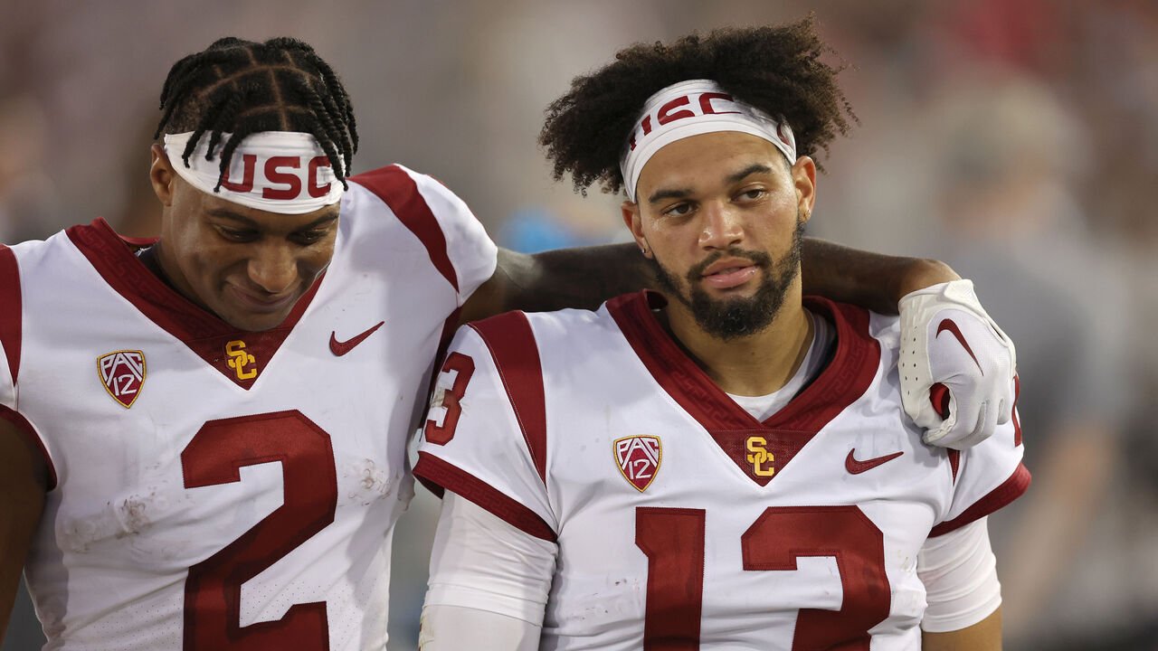 STANFORD, CALIFORNIA - SEPTEMBER 10: Brenden Rice #2 and Caleb Williams #13 of the USC Trojans stand on the sideline during their game against the Stanford Cardinal at Stanford Stadium on September 10, 2022 in Stanford, California.