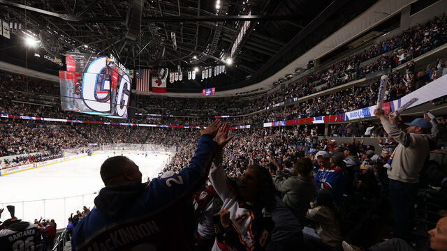 DENVER, COLORADO - MARCH 30: Fans of the Colorado Avalanche cheer against the Nashville Predators at Ball Arena on March 30, 2024 in Denver, Colorado.