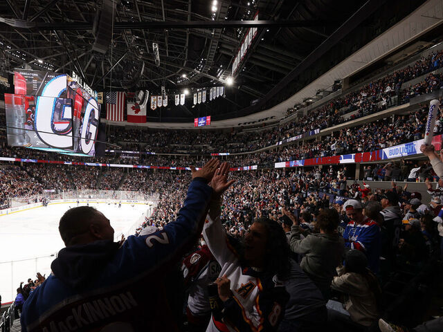 DENVER, COLORADO - MARCH 30: Fans of the Colorado Avalanche cheer against the Nashville Predators at Ball Arena on March 30, 2024 in Denver, Colorado.