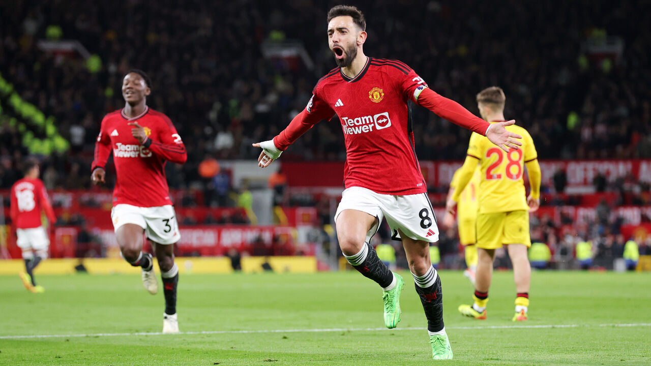 MANCHESTER, ENGLAND - APRIL 24: Bruno Fernandes of Manchester United celebrates scoring his team's third goal during the Premier League match between Manchester United and Sheffield United at Old Trafford on April 24, 2024 in Manchester, England.