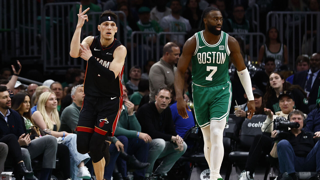BOSTON, MA - APRIL 24: Tyler Herro #14 of the Miami Heat celebrates a three-point basket as he runs past Jaylen Brown #7 of the Boston Celtics during the third quarter of game two of the Eastern Conference First Round Playoffs at TD Garden on April 24, 2024 in Boston, Massachusetts. NOTE TO USER: User expressly acknowledges and agrees that, by downloading and/or using this Photograph, user is consenting to the terms and conditions of the Getty Images License Agreement.