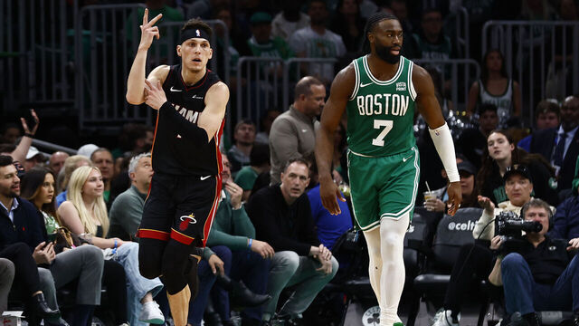 BOSTON, MA - APRIL 24: Tyler Herro #14 of the Miami Heat celebrates a three-point basket as he runs past Jaylen Brown #7 of the Boston Celtics during the third quarter of game two of the Eastern Conference First Round Playoffs at TD Garden on April 24, 2024 in Boston, Massachusetts. NOTE TO USER: User expressly acknowledges and agrees that, by downloading and/or using this Photograph, user is consenting to the terms and conditions of the Getty Images License Agreement.