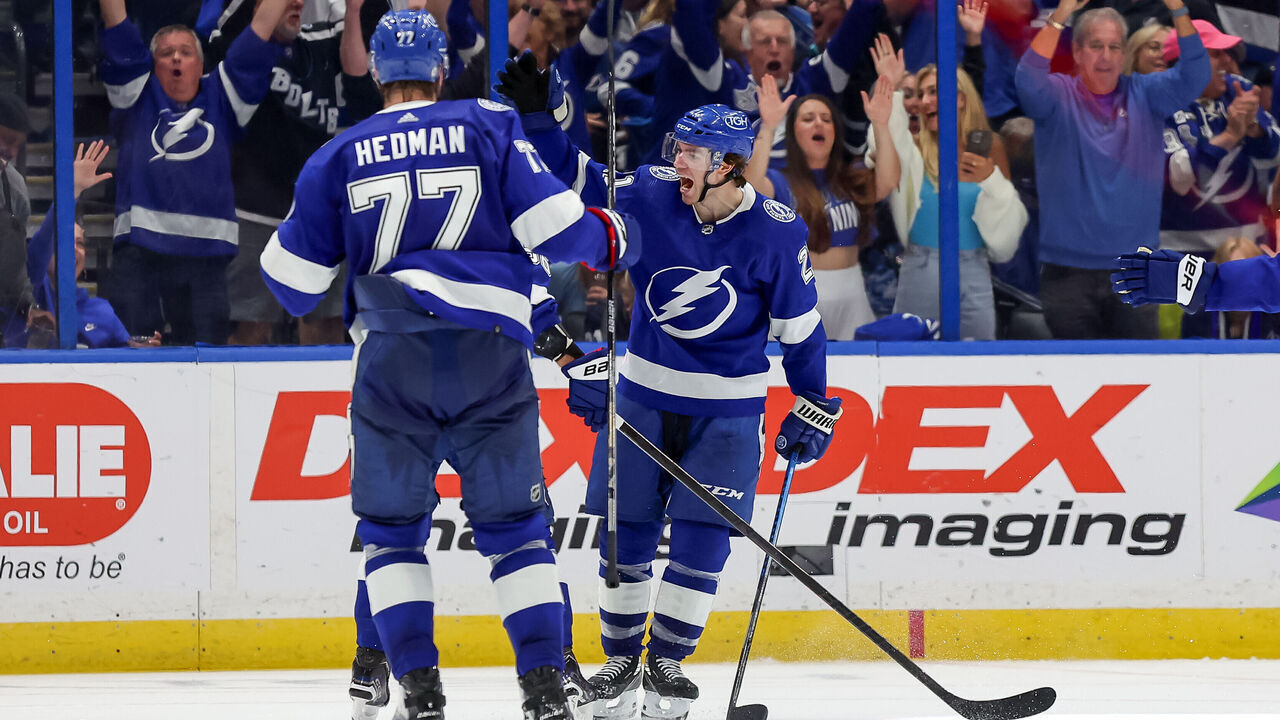 TAMPA, FL - MARCH 14: Brayden Point #21 of the Tampa Bay Lightning, right, celebrates his third goal of the game against the New York Rangers with Victor Hedman #77 during the third period at the Amalie Arena on March 14, 2024 in Tampa, Florida.