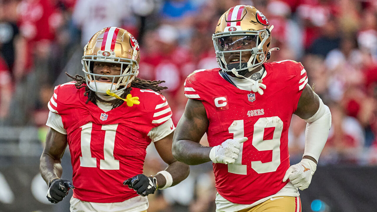 GLENDALE, ARIZONA - DECEMBER 17: Deebo Samuel #19 of the San Francisco 49ers and Brandon Aiyuk #11 of the San Francisco 49ers look on in action during a game between the San Francisco 49ers and the Arizona Cardinals at State Farm Stadium on December 17, 2023 in Glendale, Arizona.